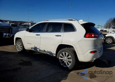 2016 Jeep Cherokee Overland из США, поврежденный, VIN 1C4PJMJS9GW300484